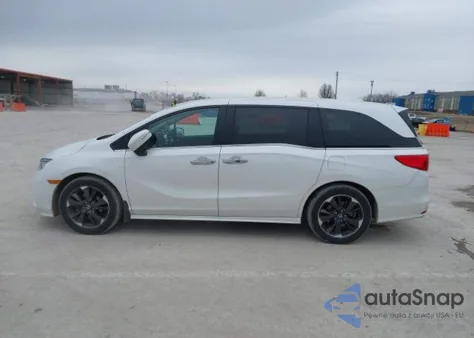 2023 Honda Odyssey Touring from USA, damaged, VIN 5FNRL6H85PB504504